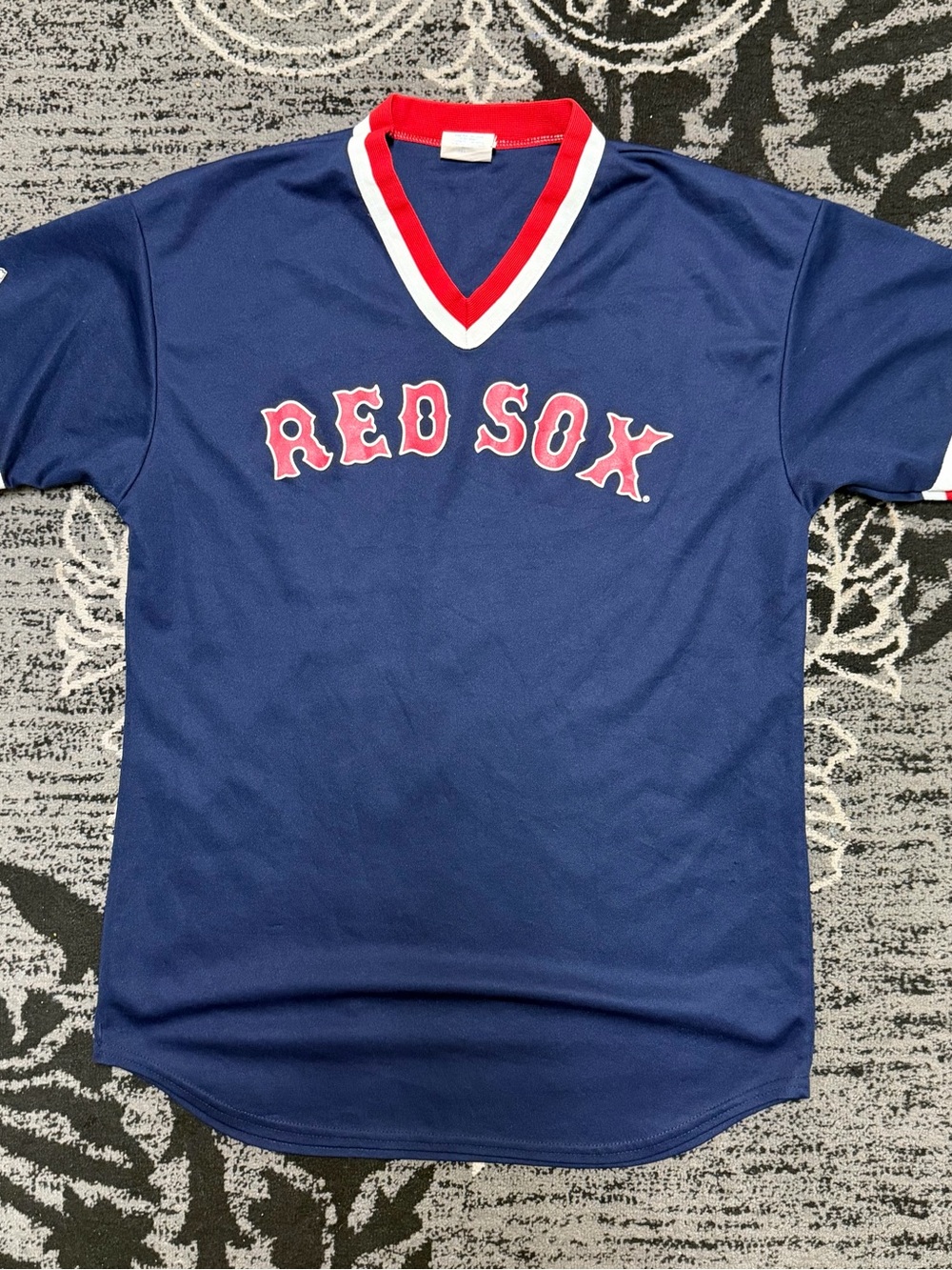 Majestic Blue and Red Logo Apparel Tag Detail